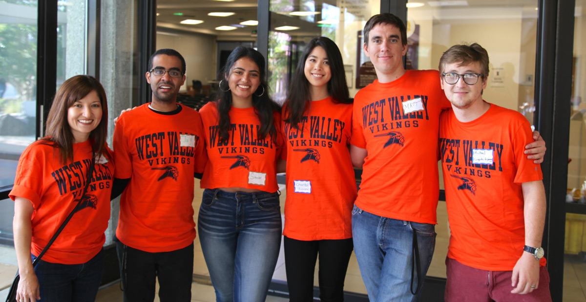 Students in orange shirts during Convocation