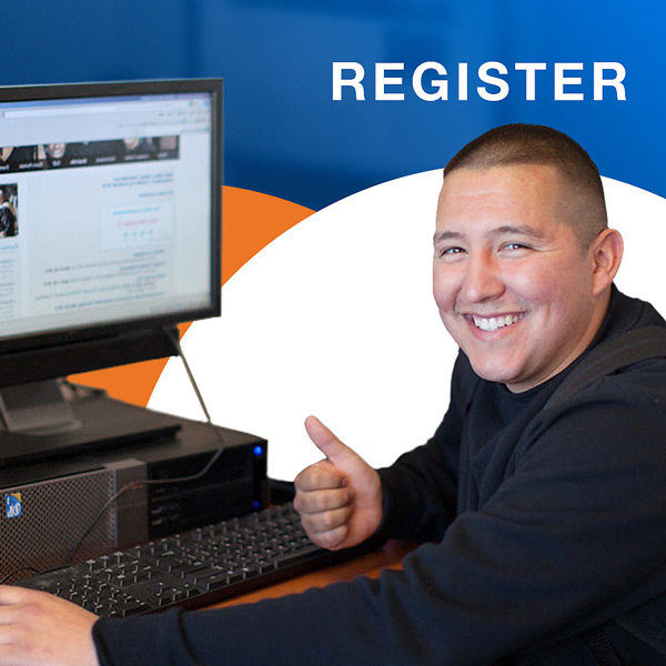 Student with thumbs up sitting at computer