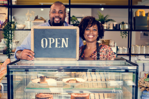 Happy couple opens bakery